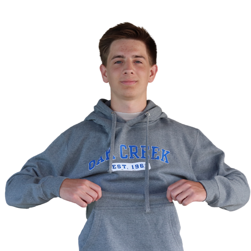 Person wearing Grey hoodie with Oak Creek Logo EST 1962
