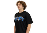 Black t shirt with writing across the upper chest saying Oak Creek Knights with and OC logo.