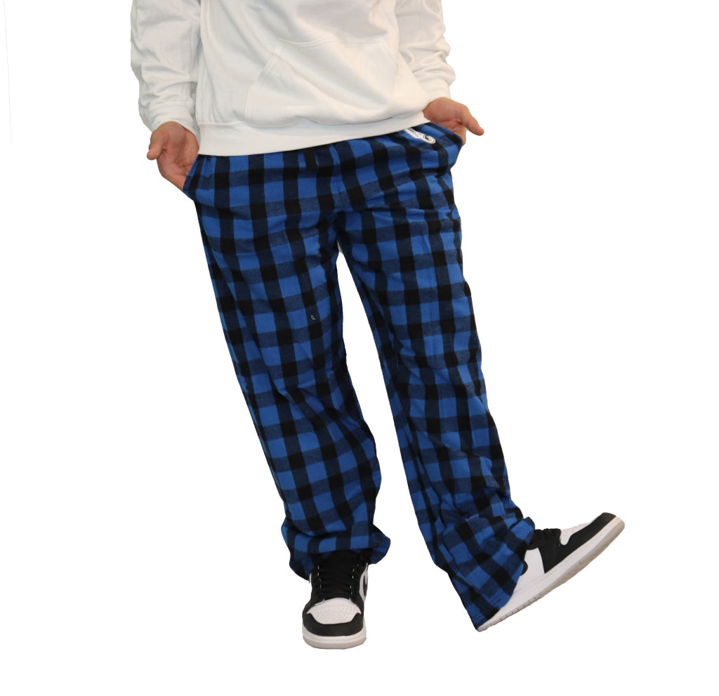 Royal blue and black plaid pajama pants with OC logo on upper left leg.